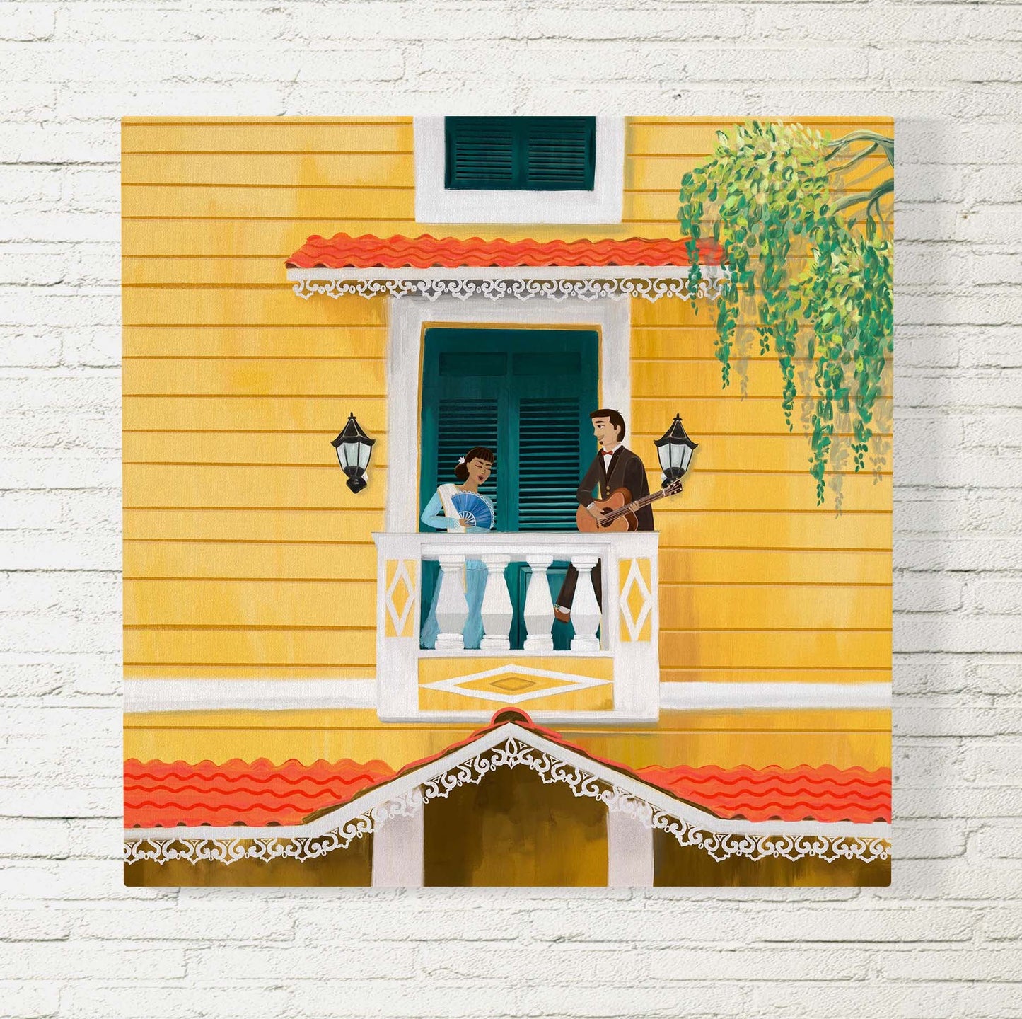 Canvas print of a couple singing a mando on a balcao of a yellow building in the bylanes of Goa